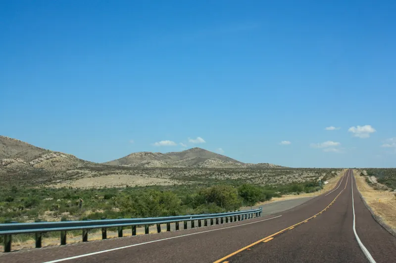 Highway through West Texas used for mobile home moving and transport